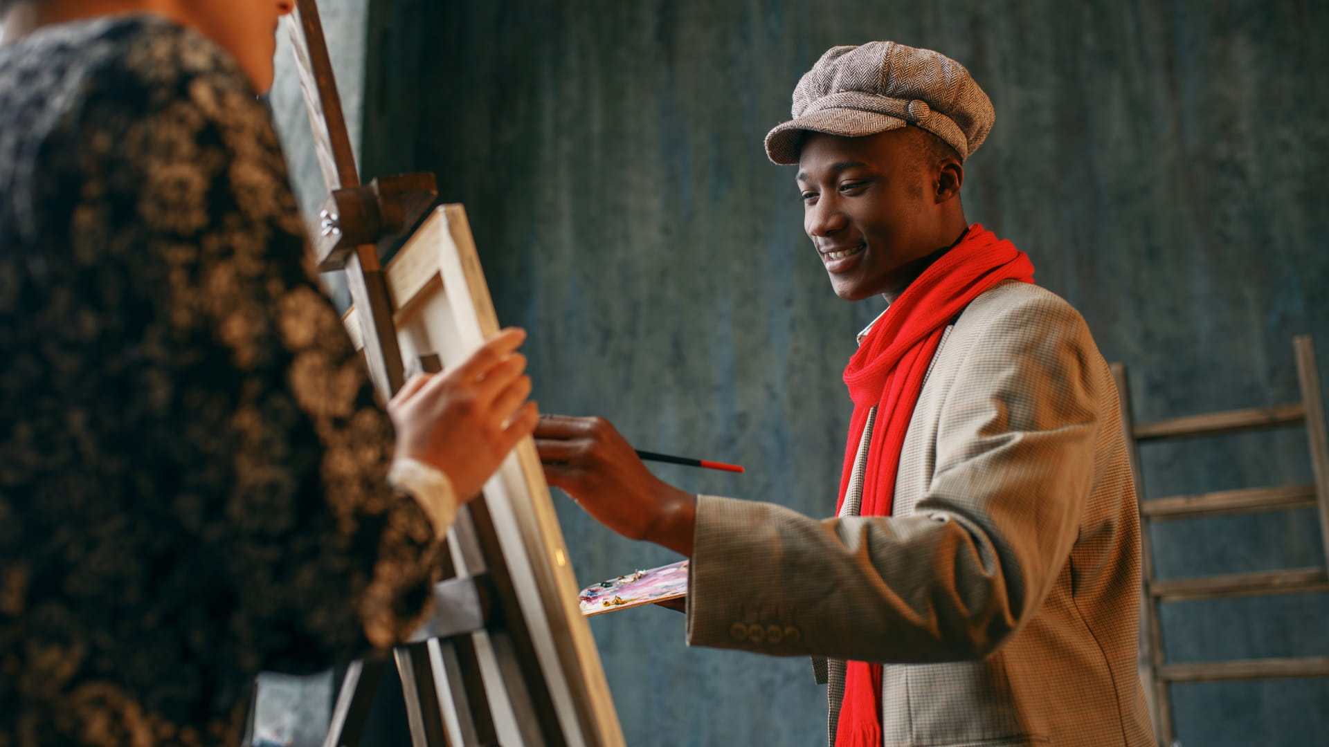 Artist painting on an easel