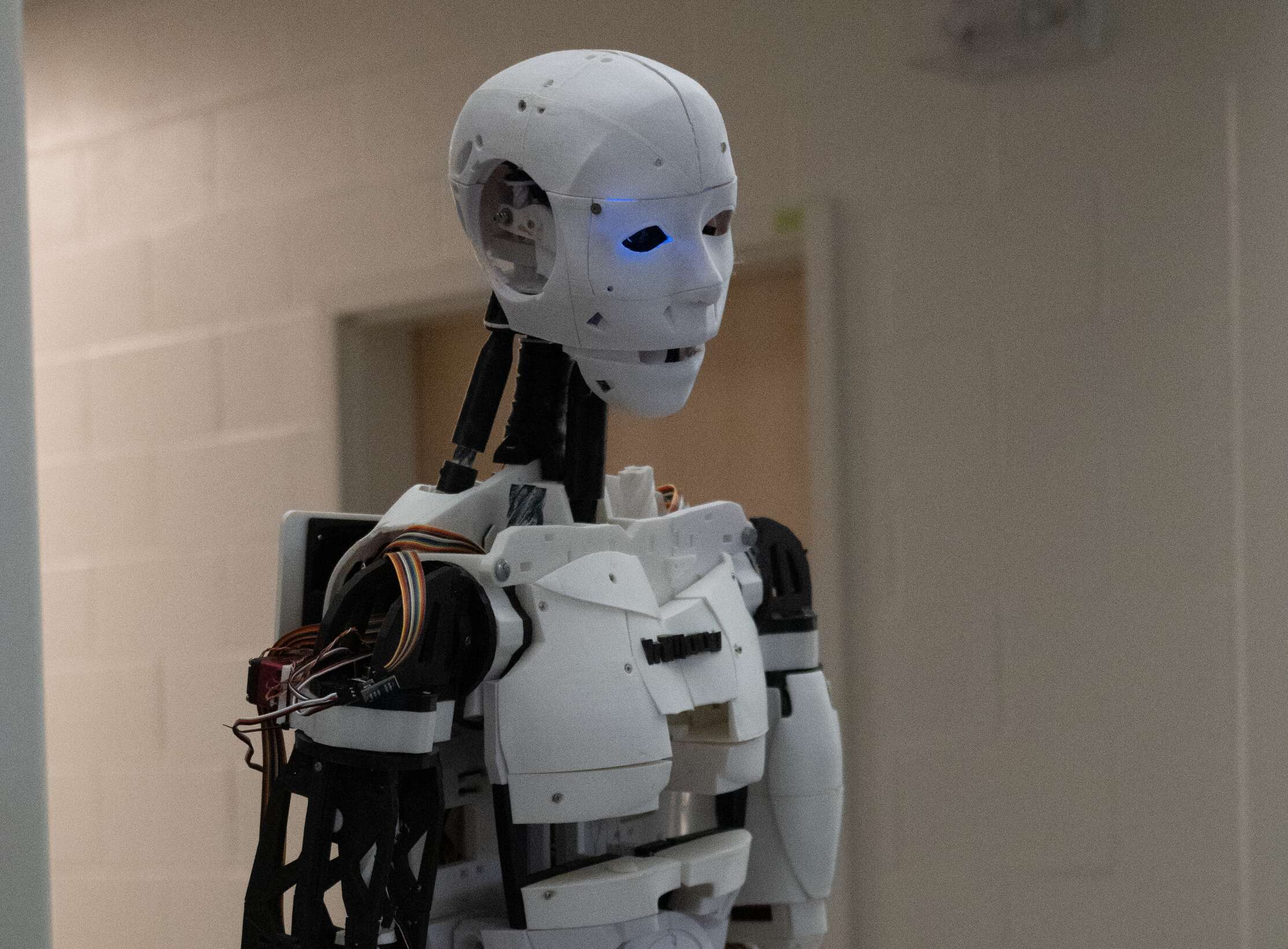 A white robot that was created by a student at one of our previous fairs