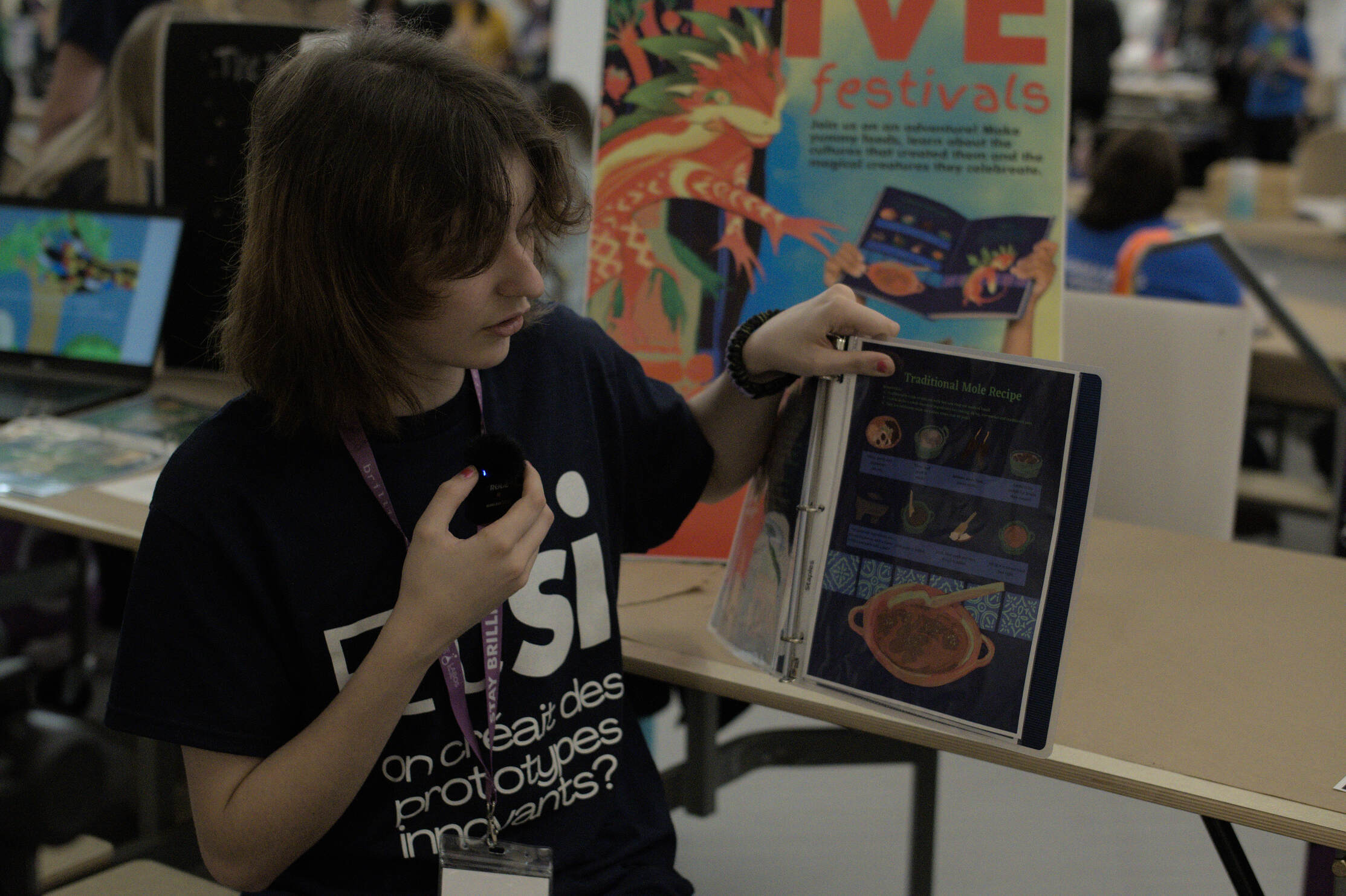 Youth presenting their book at a previous fair