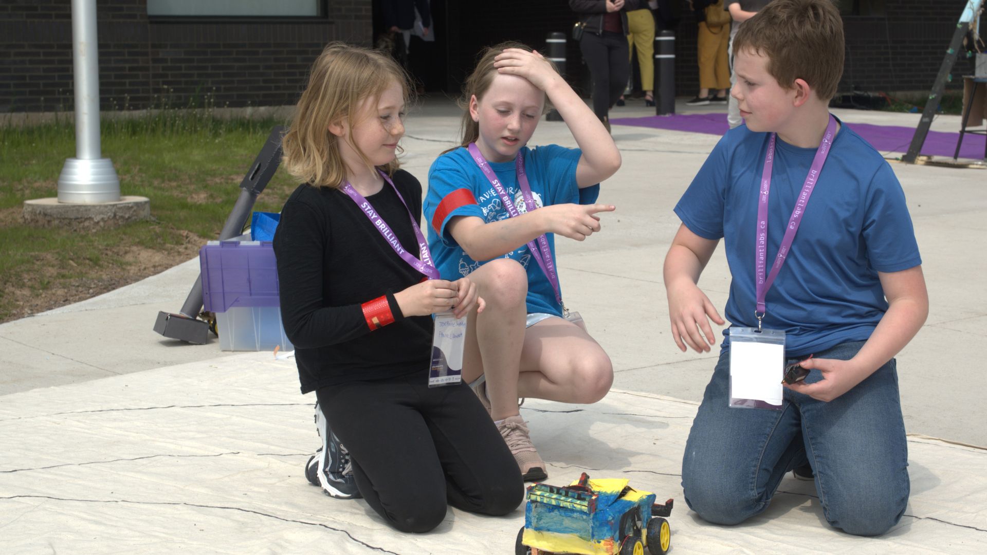 Youth working with a robot in one of our programs